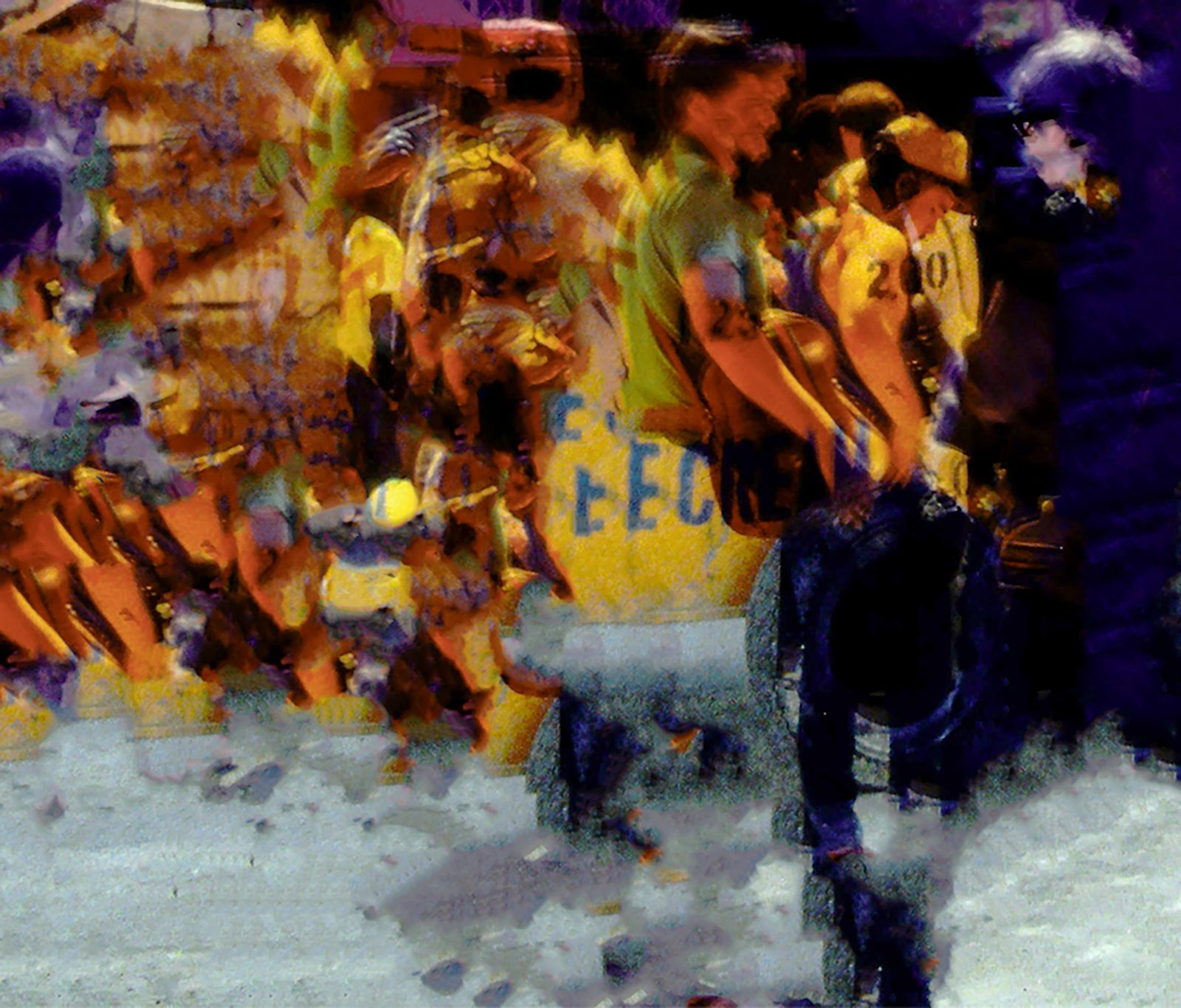 A heavily distorted close-up of people crossing a street, smeared in saturated yellow, orange and violet.